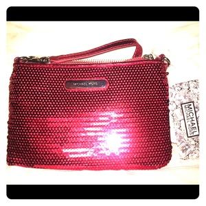 Michael Kors red sequin wristlet